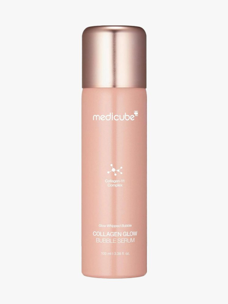 Medicube Collagen Glow Bubble Serum peach bottle with rose gold cap on light gray background